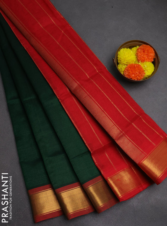 Silk cotton saree green and red with plain body and zari woven border