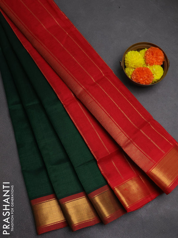 Silk cotton saree green and red with plain body and zari woven border
