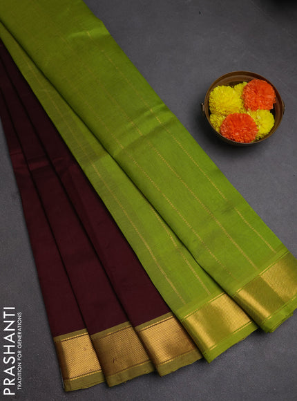 Silk cotton saree coffee brown and light green with plain body and zari woven border