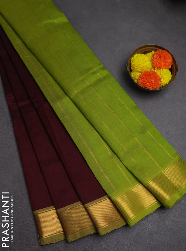 Silk cotton saree coffee brown and light green with plain body and zari woven border
