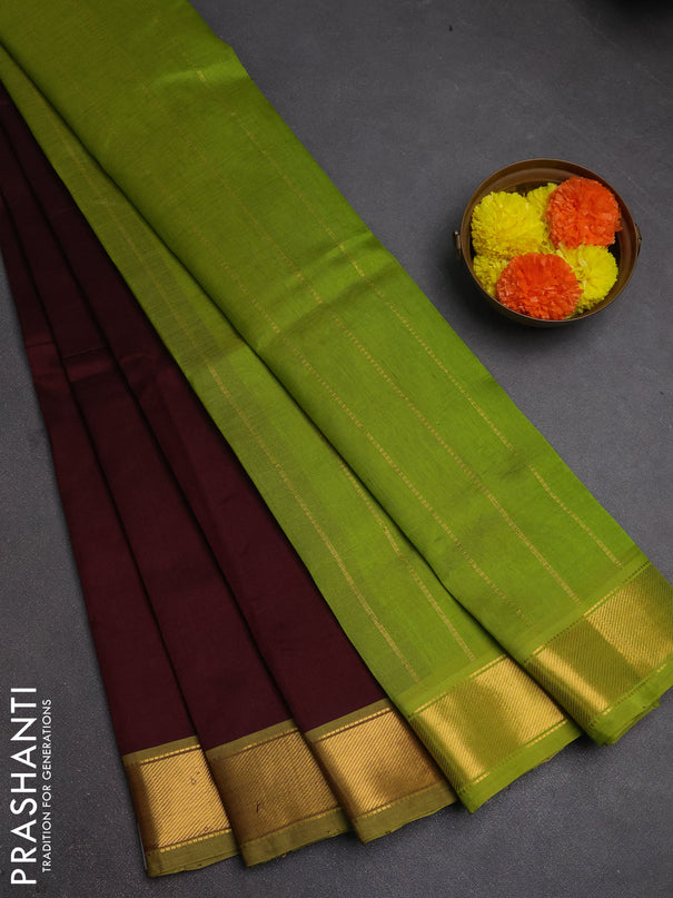 Silk cotton saree coffee brown and light green with plain body and zari woven border