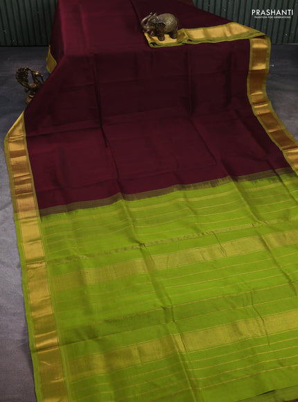 Silk cotton saree coffee brown and light green with plain body and zari woven border