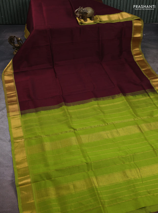 Silk cotton saree coffee brown and light green with plain body and zari woven border