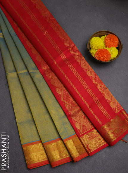 Silk cotton saree dual shade of bluish mustard and red with plain body and zari woven border