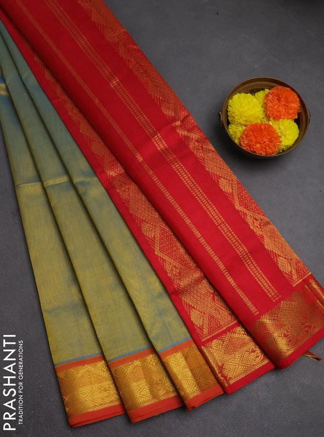 Silk cotton saree dual shade of bluish mustard and red with plain body and zari woven border