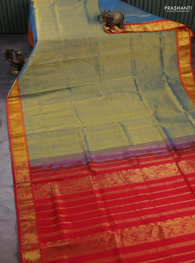 Silk cotton saree dual shade of bluish mustard and red with plain body and zari woven border
