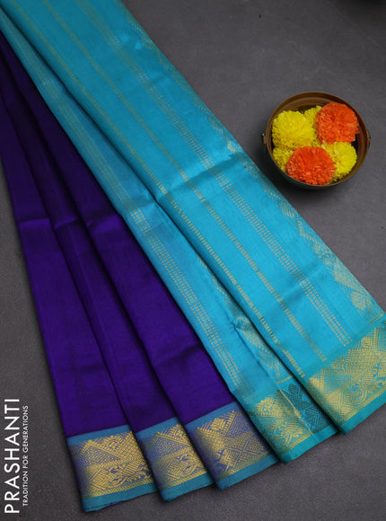 Silk cotton saree blue and teal blue with plain body and zari woven border