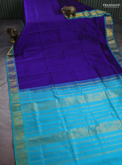 Silk cotton saree blue and teal blue with plain body and zari woven border