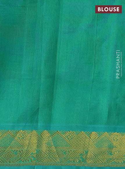 Silk cotton saree violet and teal green with plain body and zari woven border