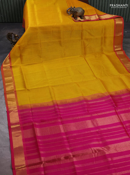 Silk cotton saree mustard yellow and pink with plain body and zari woven border