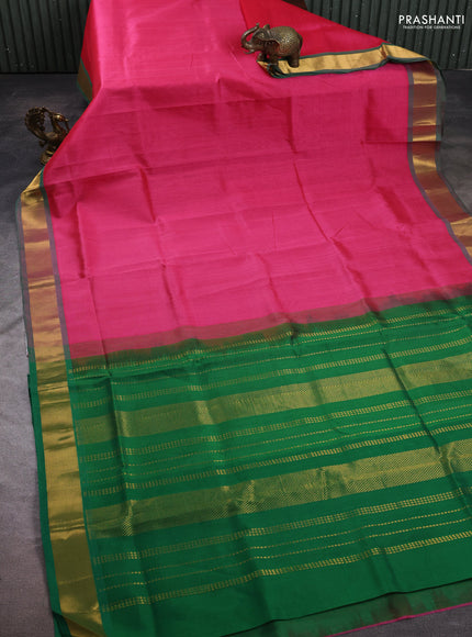 Silk cotton saree pink and green with plain body and zari woven border