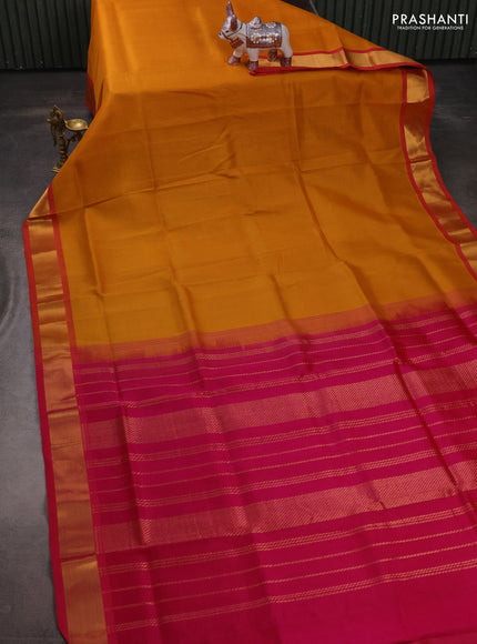 Silk cotton saree mustard yellow and pink with plain body and zari woven border