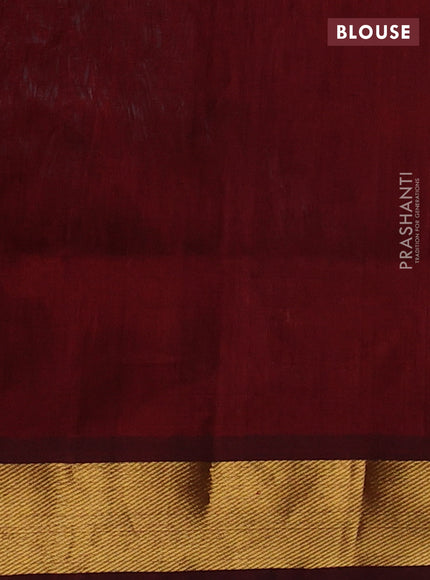 Silk cotton saree teal green and maroon with plain body and zari woven border