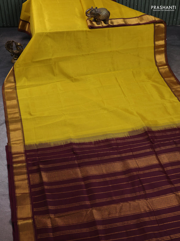 Silk cotton saree lime yellow and wine shade with plain body and zari woven border