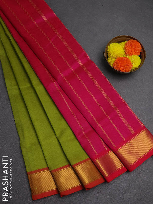 Silk cotton saree light green and pink with plain body and zari woven border