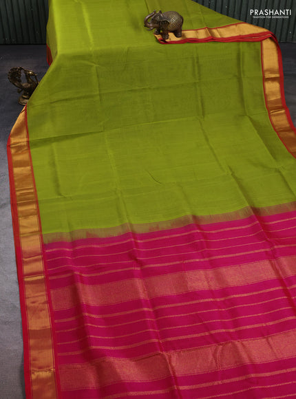 Silk cotton saree light green and pink with plain body and zari woven border