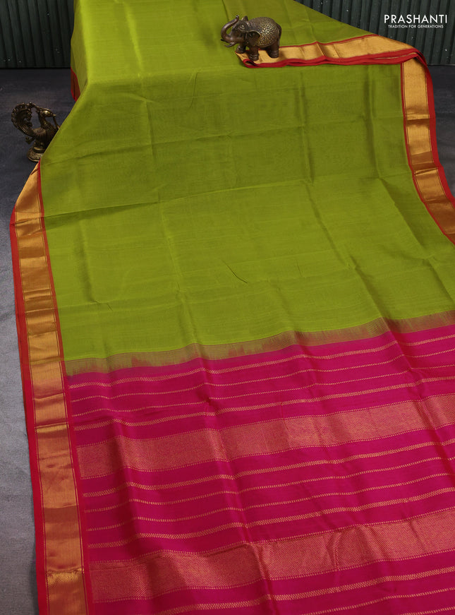 Silk cotton saree light green and pink with plain body and zari woven border