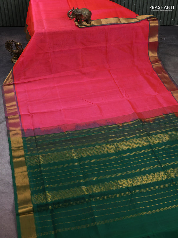 Silk cotton saree candy pink and green with plain body and zari woven border
