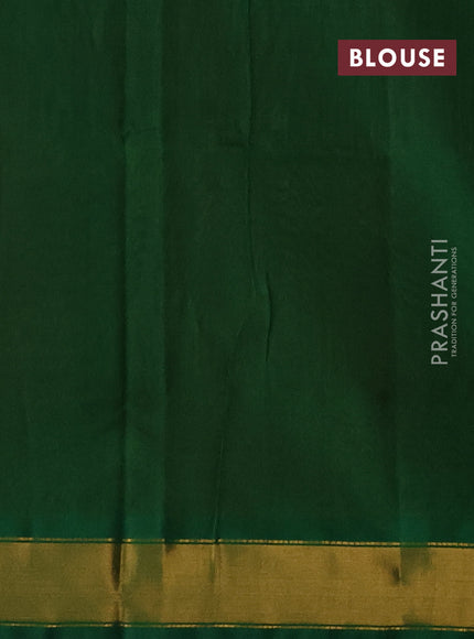 Silk cotton saree sunset orange and green with plain body and zari woven border