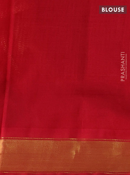 Silk cotton saree light green and red with plain body and zari woven border