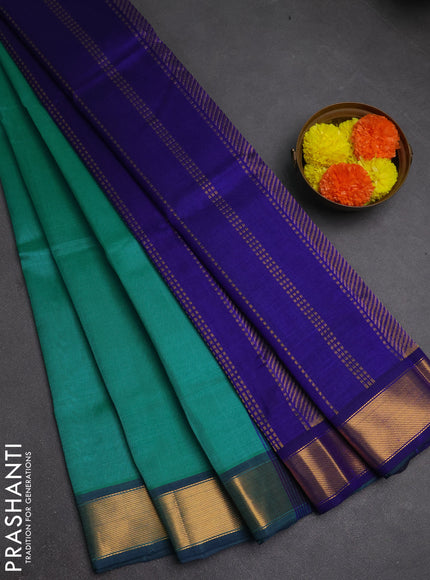 Silk cotton saree teal blue and blue with plain body and zari woven border