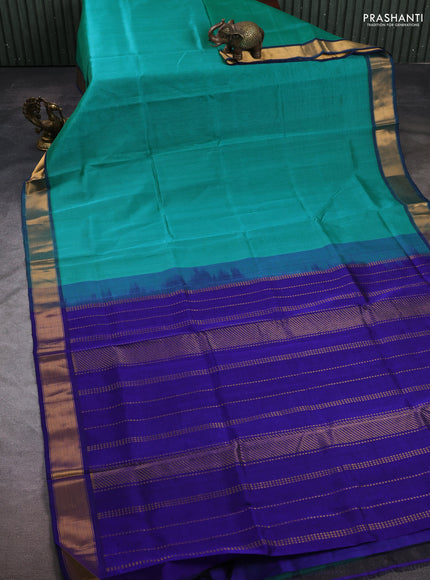 Silk cotton saree teal blue and blue with plain body and zari woven border