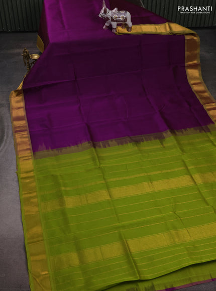 Silk cotton saree purple and light green with plain body and zari woven border