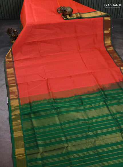 Silk cotton saree peach orange and green with plain body and zari woven border