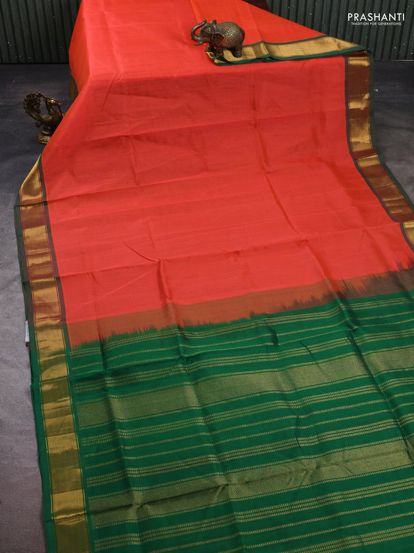 Silk cotton saree peach orange and green with plain body and zari woven border