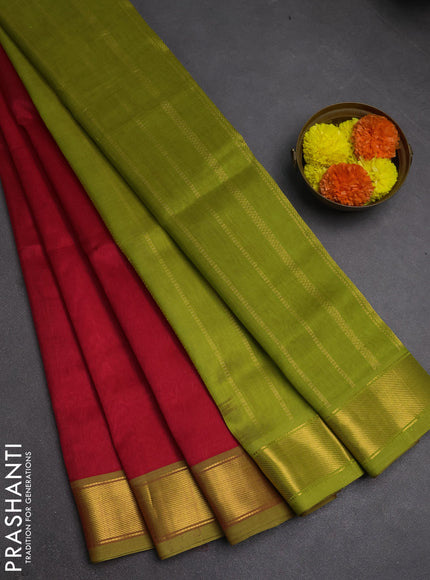 Silk cotton saree tomato red and light green with plain body and zari woven border