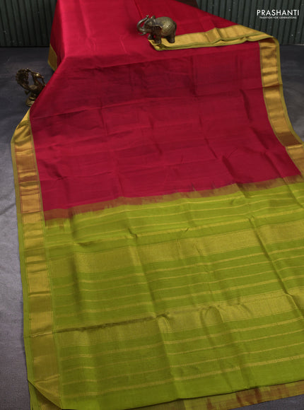 Silk cotton saree tomato red and light green with plain body and zari woven border