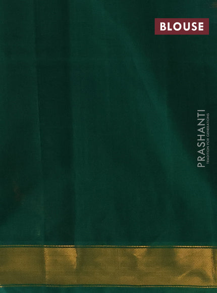 Silk cotton saree peach orange and green with plain body and zari woven border