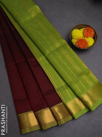 Silk cotton saree maroon and green with plain body and zari woven border