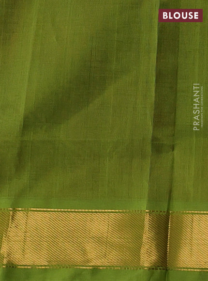 Silk cotton saree maroon and green with plain body and zari woven border