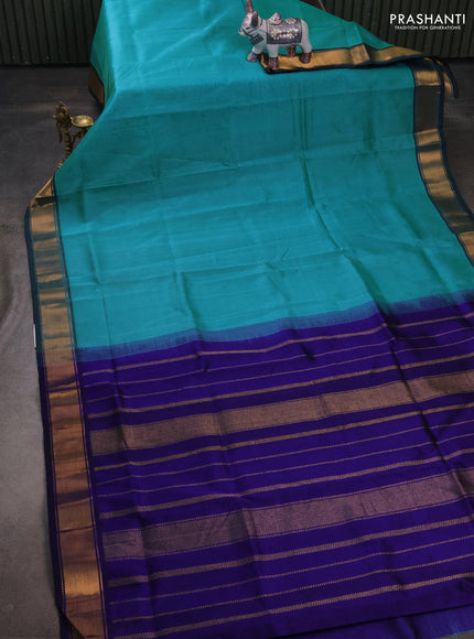 Silk cotton saree teal blue and blue with plain body and zari woven border