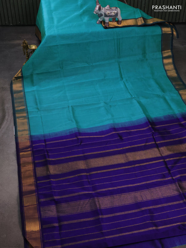 Silk cotton saree teal blue and blue with plain body and zari woven border