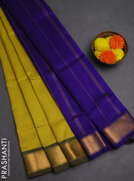 Silk cotton saree mustard yellow and blue with plain body and zari woven border