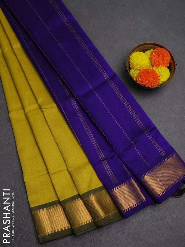 Silk cotton saree mustard yellow and blue with plain body and zari woven border