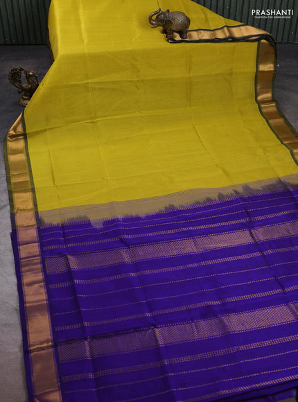 Silk cotton saree mustard yellow and blue with plain body and zari woven border