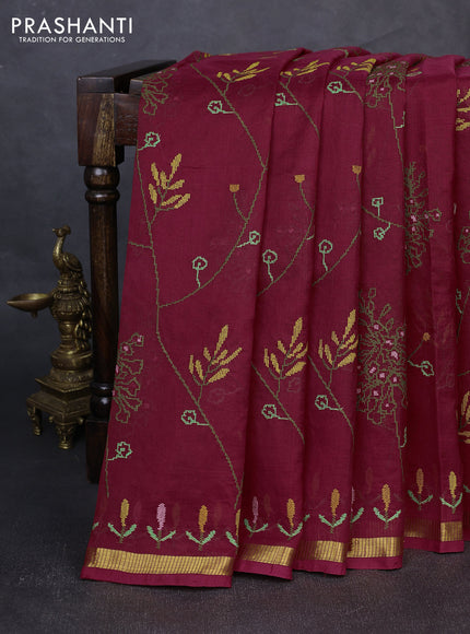 Silk cotton saree maroon with allover convent embroidery weaves and zari woven border
