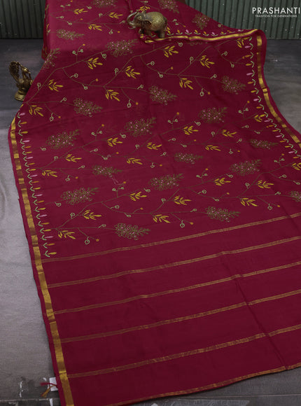 Silk cotton saree maroon with allover convent embroidery weaves and zari woven border