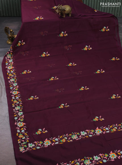 Silk cotton saree deep wine shade with floral convent embroidery buttas and embroidery border