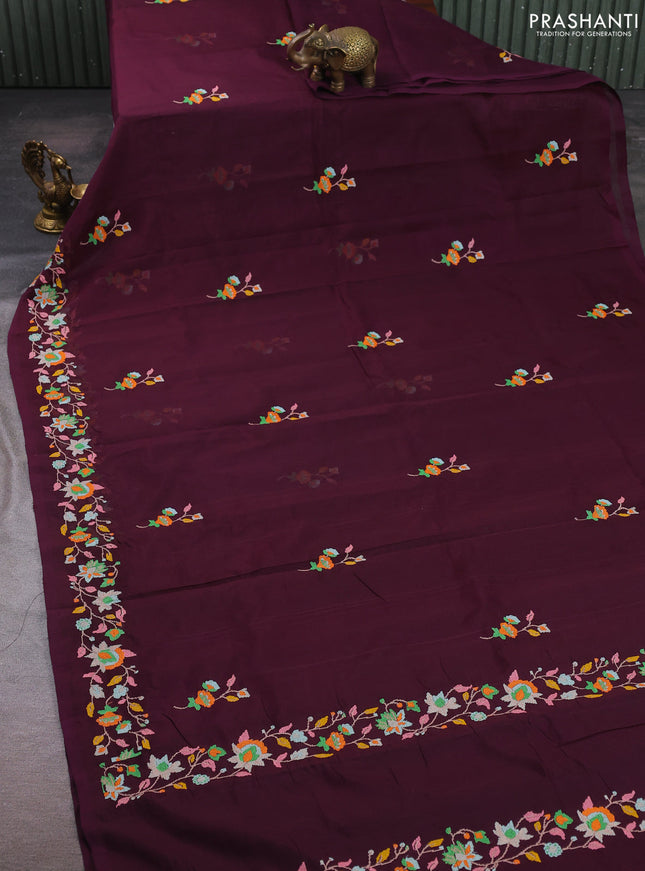Silk cotton saree deep wine shade with floral convent embroidery buttas and embroidery border