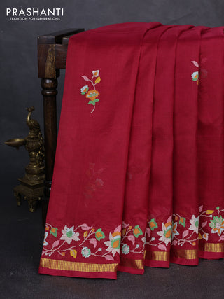 Silk cotton saree maroon with floral convent embroidery buttas and zari woven border