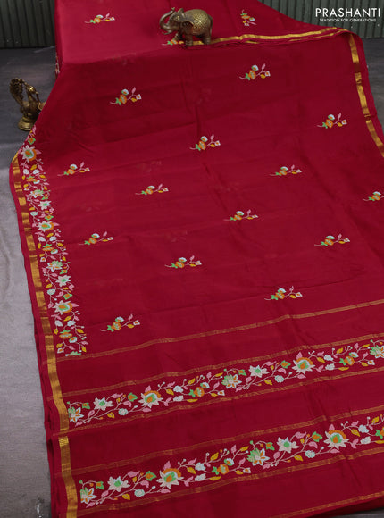 Silk cotton saree maroon with floral convent embroidery buttas and zari woven border