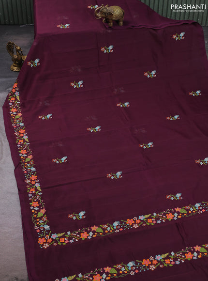 Silk cotton saree deep wine shade with floral convent embroidery buttas and embroidery border
