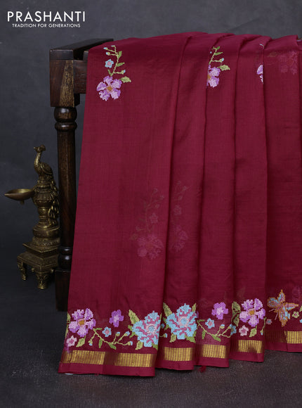 Silk cotton saree maroon with floral convent embroidery buttas and zari woven border
