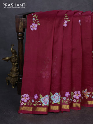 Silk cotton saree maroon with floral convent embroidery buttas and zari woven border