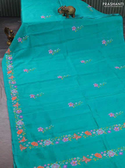 Silk cotton saree teal green with floral convent embroidery buttas and embroidery border