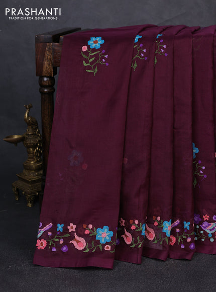 Silk cotton saree deep wine shade with floral convent embroidery buttas and zari woven border